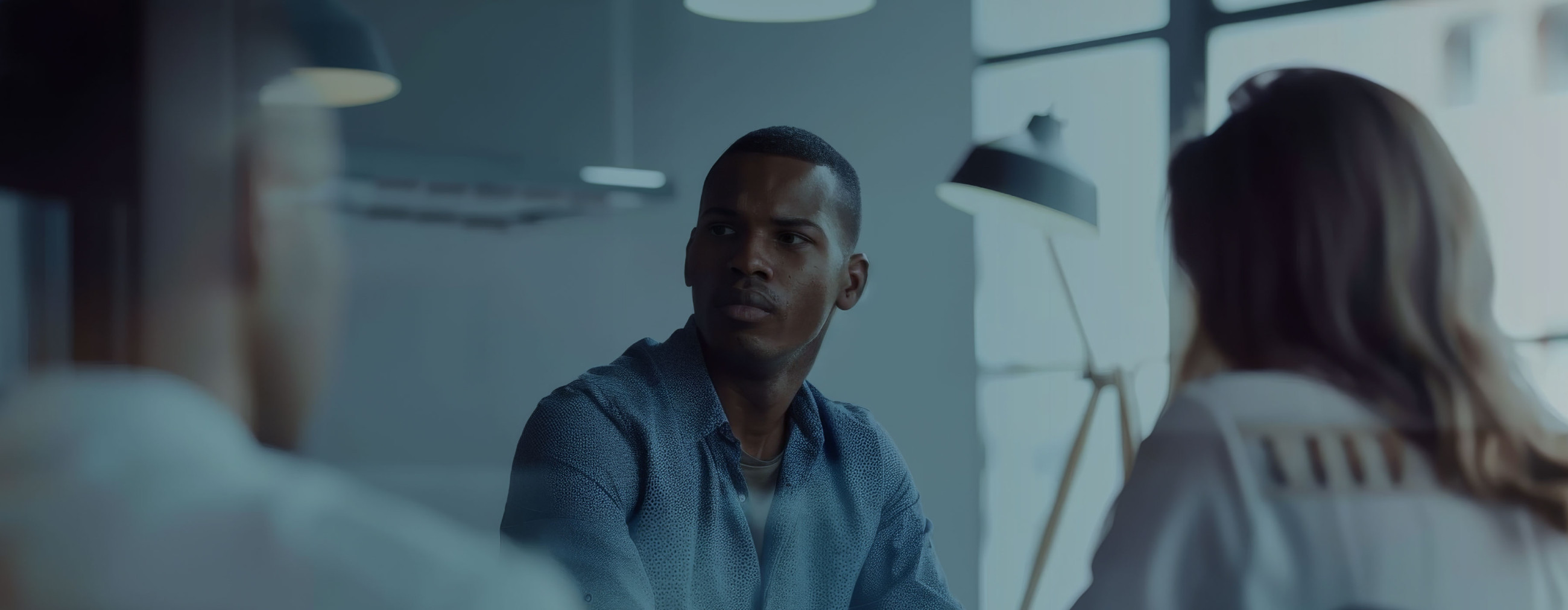 A man attentively participating in a meeting